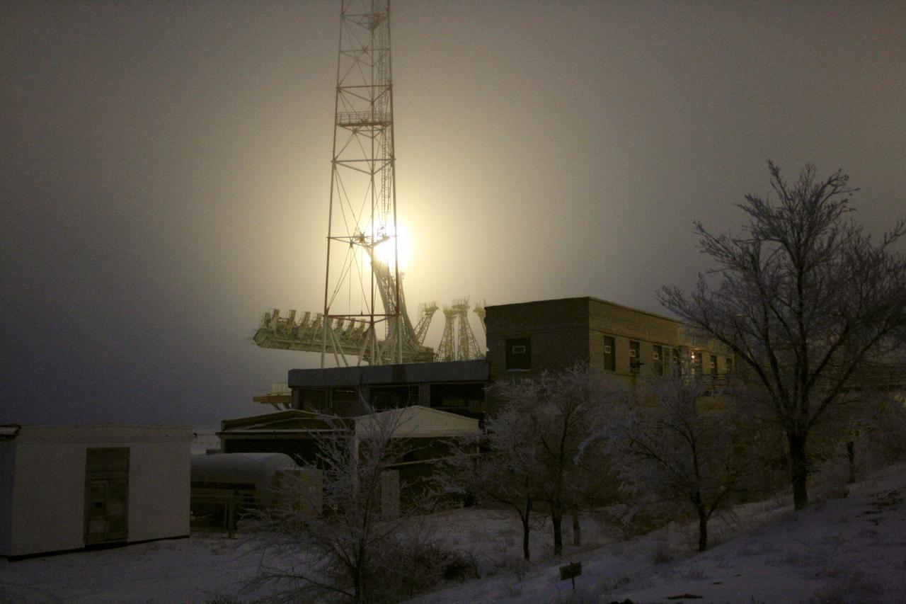 JSC2007-E-03080 (16 Jan. 2007) --- Roll-out of the Progress 24 vehicle occurred on schedule at 7:00 a.m., Jan. 16, 2007 at the Baikonur Cosmodrome, Kazakhstan.    The vehicle was in the vertical and hard-down at the pad by 9:30 a.m. The gantry towers were placed around the vehicle shortly thereafter. Progress is targeted for launch on Jan. 18, 2007 for a two-day trip to the International Space Station carrying 2 1/2 tons of food, fuel and supplies for the Expedition 14 crew. Photo Credit: NASA