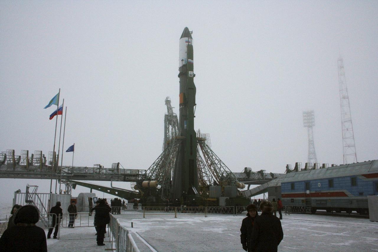 JSC2007-E-03082   (16 Jan. 2007) --- Roll-out of the Progress 24 vehicle occurred on schedule at 7:00 a.m., Jan. 16, 2007 at the Baikonur Cosmodrome, Kazakhstan. The vehicle was in the vertical and hard-down at the pad by 9:30 a.m. The gantry towers were placed around the vehicle shortly thereafter. Progress is targeted for launch on Jan. 18, 2007 for a two-day trip to the International Space Station carrying 2 1/2 tons of food, fuel and supplies for the Expedition 14 crew. Photo Credit: NASA