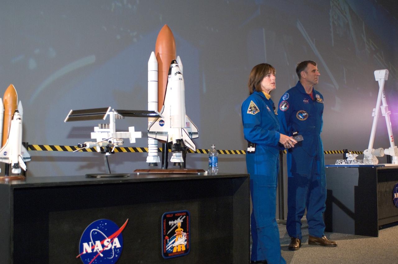 JSC2007-E-03676 (19 Jan. 2007) --- Educator astronaut Barbara R. Morgan (left) and Canadian Space Agency astronaut Dafydd R. (Dave) Williams speak to an audience of students and media during a demonstration at Space Center Houston. Morgan has been named as a crew member for the STS-118 mission, scheduled to launch in the summer of 2007.