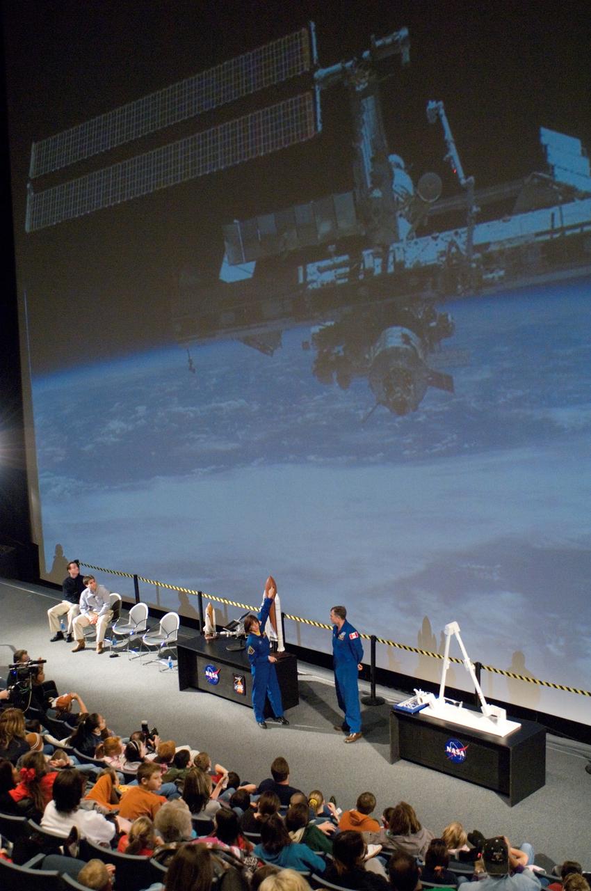 JSC2007-E-03779 (19 Jan. 2007) --- Educator astronaut Barbara R. Morgan and Canadian Space Agency astronaut Dafydd R. (Dave) Williams speak to an audience of students and media during a demonstration at Space Center Houston. Morgan has been named as a crew member for the STS-118 mission, scheduled to launch in the summer of 2007.