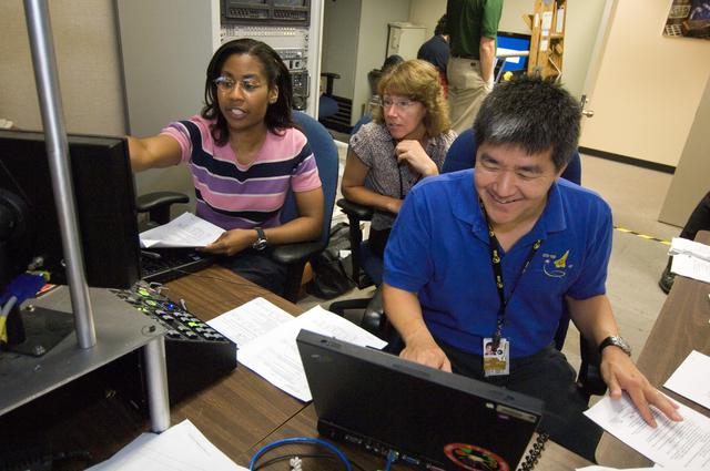 NASA image: STS-120 crew along with Expedition crew members Dan Tani and Sandra Magnus