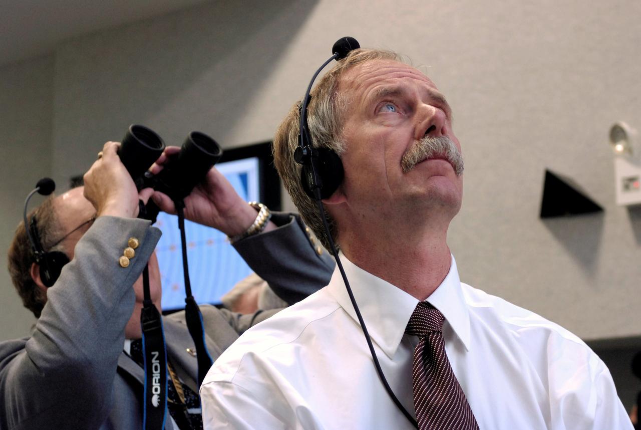 JSC2007-E-41603 (8 August 2007) --- William Gerstenmaier (foreground),  NASA Associate Administrator for Space Operations, watches the launch of the Space Shuttle Endeavour, to get STS-118 underway,  from the Launch Control Center  August 8, 2007 at the Kennedy Space Center in Cape Canaveral, Fla. The shuttle lifted off from launch pad 39A at 6:36 p.m. (EDT). Photo Credit: NASA/Bill Ingalls