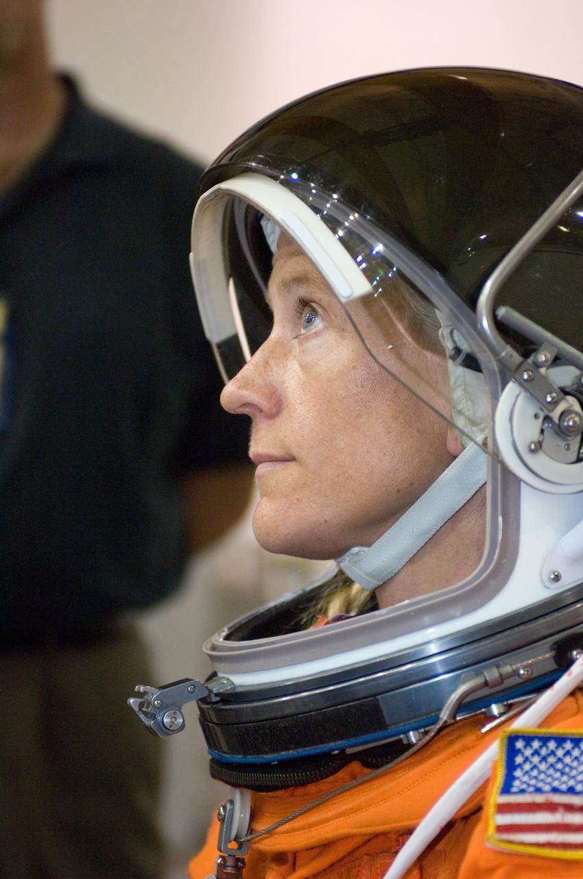 JSC2007-E-43420 (15 Aug. 2007) --- Attired in a training version of her shuttle launch and entry suit, astronaut Karen L. Nyberg, STS-124 mission specialist, awaits the start of a water survival training session in the Neutral Buoyancy Laboratory (NBL) near Johnson Space Center.