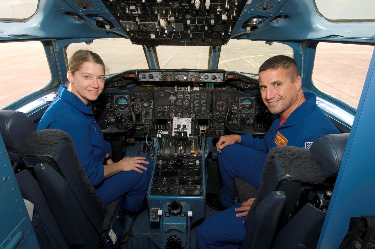 JSC2007-E-43538 (9 Aug. 2007) --- Astronauts Pamela A. Melroy, STS-120 commander, and George D. Zamka, pilot, pose for a photo in the cockpit of a NASA DC-9 aircraft during a Heavy Aircraft Training (HAT) session.