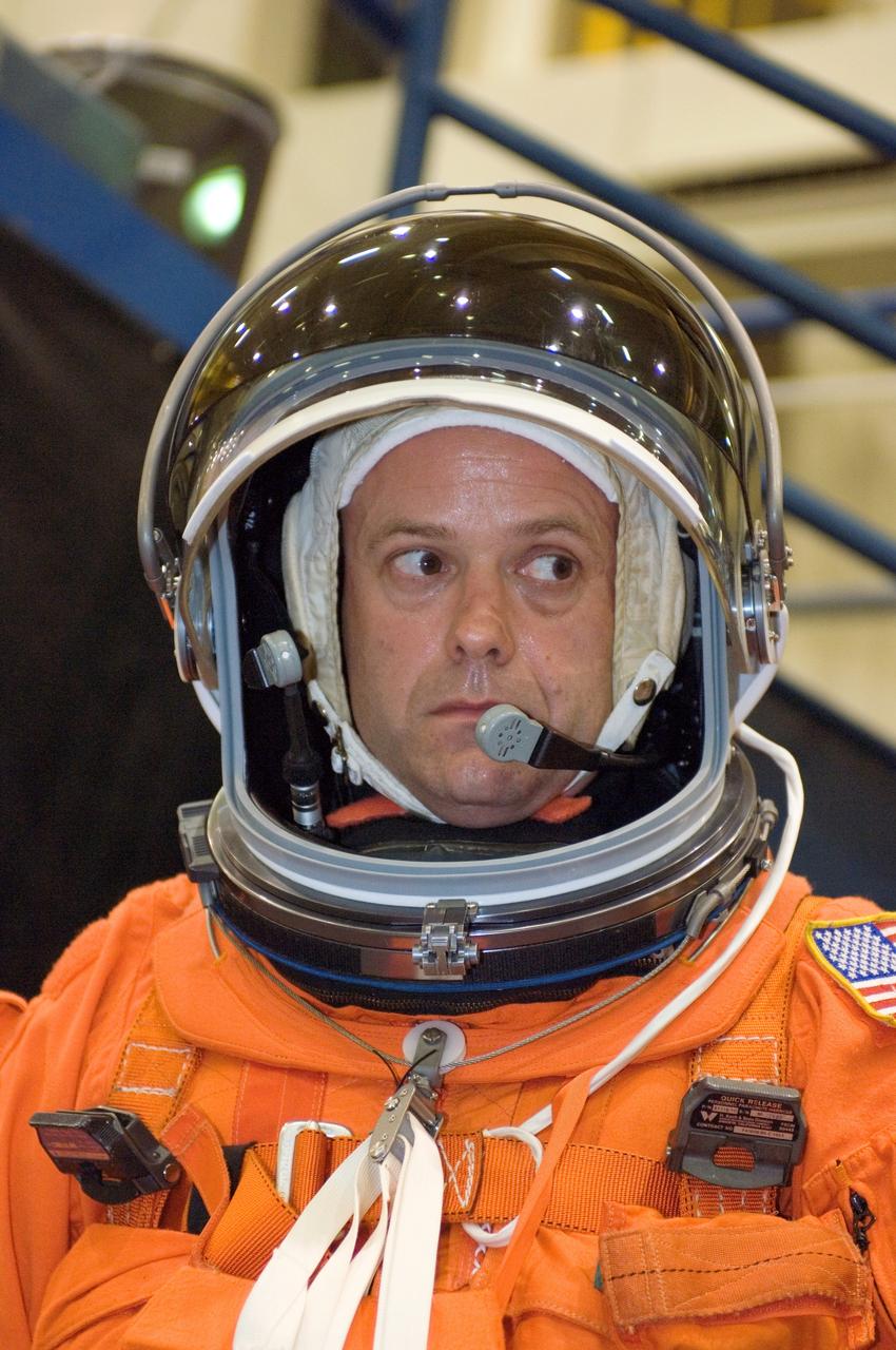 JSC2007-E-48225 (28 Sept. 2007) --- Attired in a training version of his shuttle launch and entry suit, astronaut Ronald J. Garan, STS-124 mission specialist, awaits the start of a training session in the Space Vehicle Mockup Facility at Johnson Space Center.