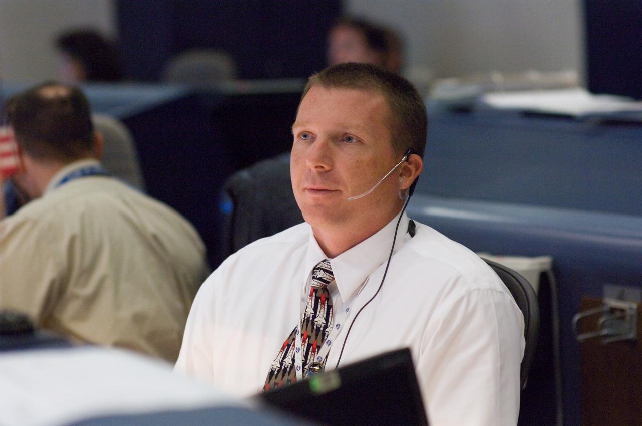JSC2007-E-053898 (23 Oct. 2007) --- Astronaut Terry W. Virts Jr., spacecraft communicator (CAPCOM), monitors data at his console in the space shuttle flight control room of Johnson Space Center's Mission Control Center (MCC) during launch countdown activities a few hundred miles away in Florida, site of Space Shuttle Discovery's scheduled STS-120 launch. Liftoff occurred at 11:38 a.m. (EDT) on Oct. 23, 2007 from launch pad 39A at Kennedy Space Center.