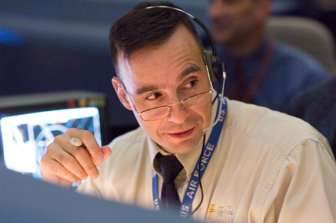 JSC2007-E-053901 (23 Oct. 2007) --- Astronaut Lee J. Archambault, spacecraft communicator (CAPCOM), monitors data at his console in the space shuttle flight control room of Johnson Space Center's Mission Control Center (MCC) during launch countdown activities a few hundred miles away in Florida, site of Space Shuttle Discovery's scheduled STS-120 launch. Liftoff occurred at 11:38 a.m. (EDT) on Oct. 23, 2007 from launch pad 39A at Kennedy Space Center.