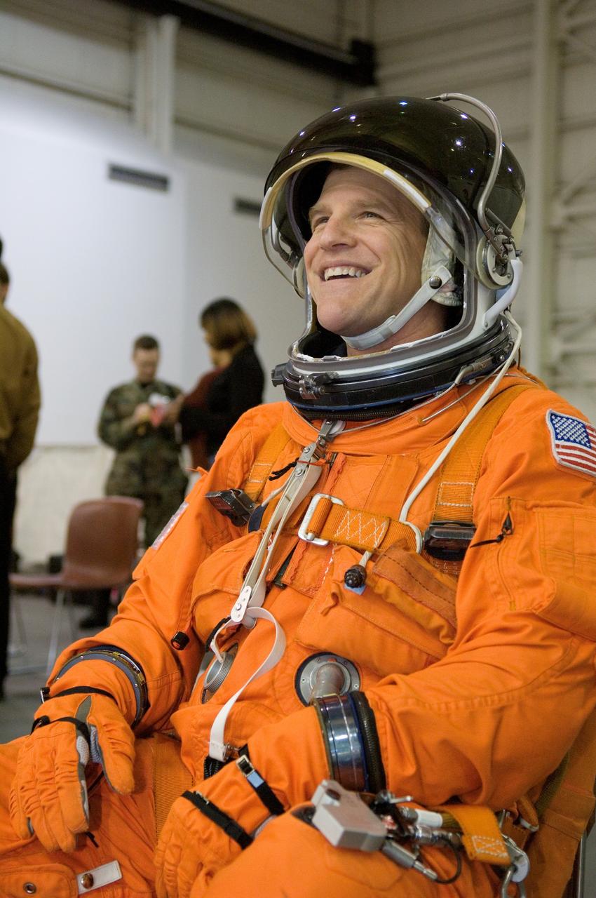 JSC2007-E-06449 (31 Jan. 2007) --- Astronaut Scott E. Parazynski, STS-120 mission specialist, attired in a training version of his shuttle launch and entry suit, awaits the start of a water survival training session in the Neutral Buoyancy Laboratory (NBL) near Johnson Space Center.