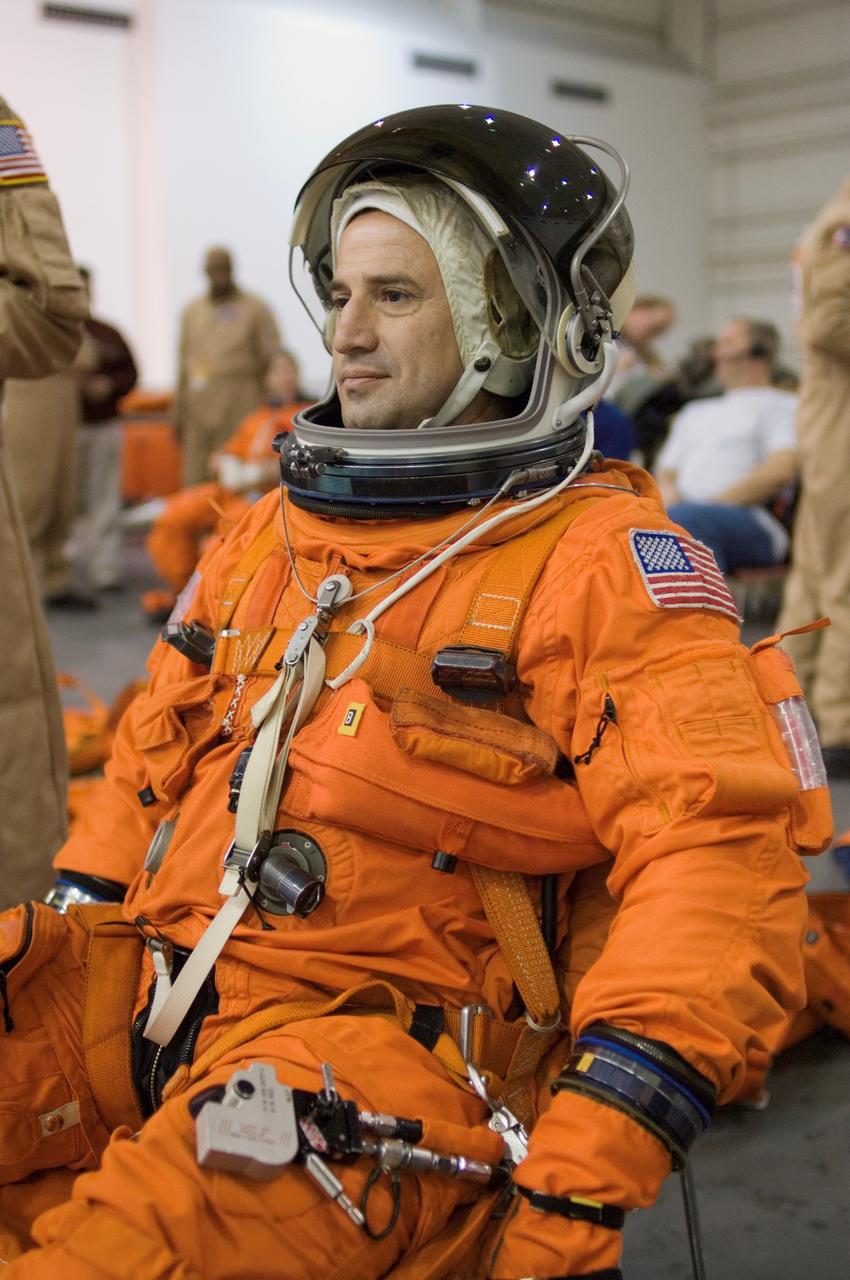 JSC2007-E-06475 (31 Jan. 2007) --- Astronaut George D. Zamka, STS-120 pilot, attired in a training version of his shuttle launch and entry suit, awaits the start of a water survival training session in the Neutral Buoyancy Laboratory (NBL) near Johnson Space Center.