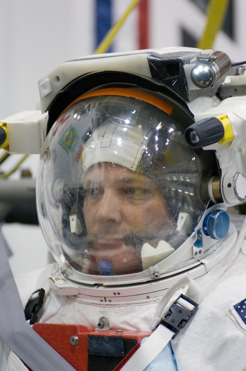 JSC2007-E-06545 (2 Feb. 2007) --- Attired in a training version of the Extravehicular Mobility Unit (EMU) spacesuit, astronaut Douglas H. Wheelock, STS-120 mission specialist, awaits the start of a training session in the waters of the Neutral Buoyancy Laboratory (NBL) near Johnson Space Center.