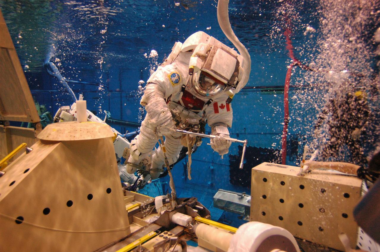 • Event (Mission for flight / Class for training): STS-118 (13A.1) • Title: STS-118 EVA 1 NBL  • Date: 4-18-07 • Location: NBL • Key words: 118, 13A.1, S5, NBL • Description: NBL underwater photos of STS-118 EVA 1 S5 install. 