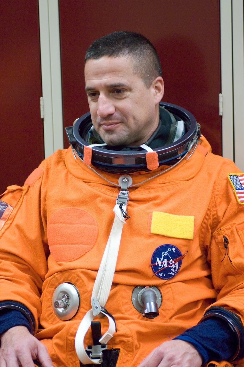 JSC2007-E-08806 (7 Feb. 2007) --- Attired in a training version of his shuttle launch and entry suit, astronaut George D. Zamka, STS-120 pilot, awaits the start of a post insertion/de-orbit training session in one of the full-scale trainers (out of frame) in the Space Vehicle Mockup Facility at Johnson Space Center.
