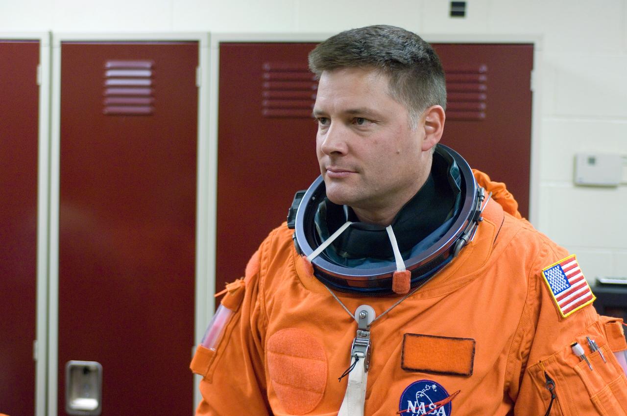 JSC2007-E-08811 (7 Feb. 2007) --- Attired in a training version of his shuttle launch and entry suit, astronaut Douglas H. Wheelock, STS-120 mission specialist, awaits the start of a post insertion/de-orbit training session in one of the full-scale trainers (out of frame) in the Space Vehicle Mockup Facility at Johnson Space Center.