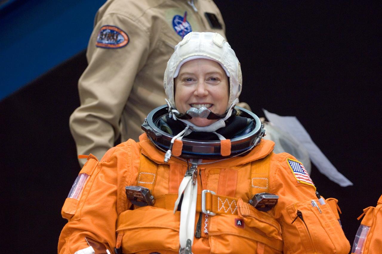 JSC2007-E-08820 (7 Feb. 2007) --- Attired in a training version of her shuttle launch and entry suit, astronaut Pamela A. Melroy, STS-120 commander, awaits the start of a post insertion/de-orbit training session in one of the full-scale trainers (out of frame) in the Space Vehicle Mockup Facility at Johnson Space Center.