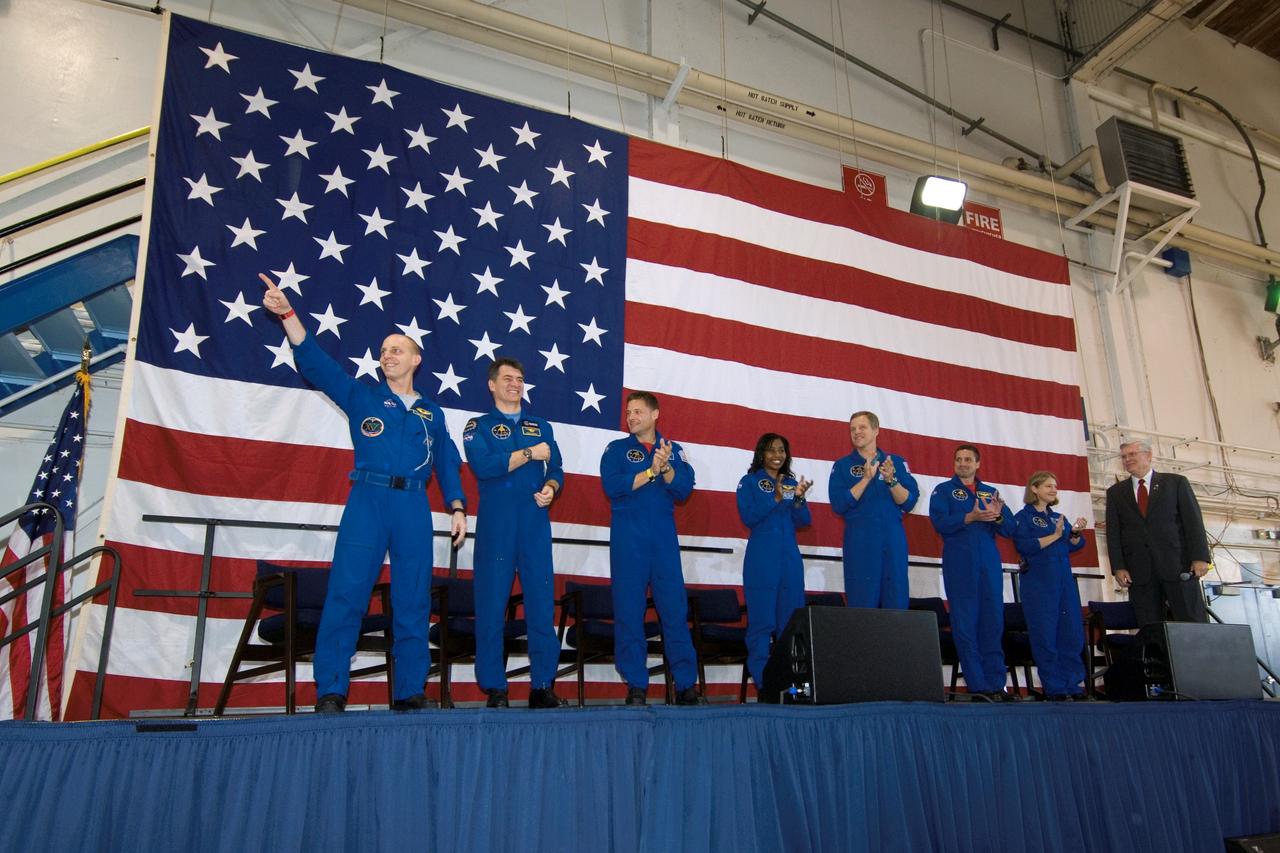 JSC2007-E-098002 (8 Nov. 2007)  --- The crew of the STS-120 mission was welcomed home to Houston Nov. 8, following the landing of Space Shuttle Discovery in Florida on  Nov. 7.  Center Director Mike Coats, far right, introduced the crew to the crowd on hand at Ellington Field. From the right are STS-120 commander Pam Melroy, pilot George Zamka and mission specialists Scott Parazynski, Stephanie Wilson, Doug Wheelock, Paolo Nespoli (ESA) and Clay Anderson were welcomed by family and friends during the ceremony.