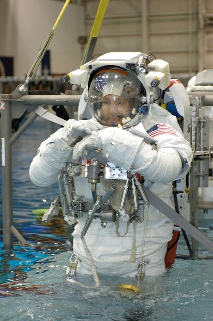 NASA image: STS-125 Crewmembers preparing for NBL dive