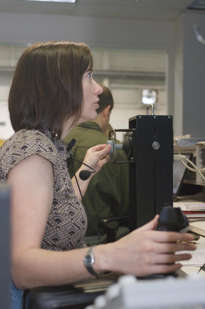 JSC2007-E-113615 (18 Dec. 2007) --- Astronaut K. Megan McArthur, STS-125 mission specialist, participates in a training session at a console in the simulation control area in the Neutral Buoyancy Laboratory (NBL) at the Sonny Carter Training Facility (SCTF) near Johnson Space Center (JSC).