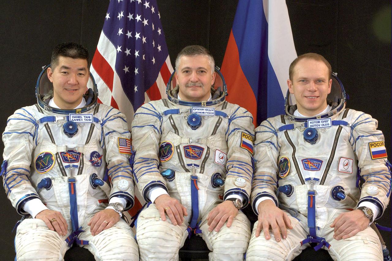 JSC2007-E-15370 (March 2007) --- Attired in Russian Sokol launch and entry suits, cosmonauts Fyodor N. Yurchikhin (center), Expedition 15 commander; and Oleg V. Kotov (right), flight engineer, both representing Russia's Federal Space Agency; and astronaut Dan Tani, flight engineer, take a break from training in Star City, Russia to pose for a portrait. Photo credit: Gagarin Cosmonaut Training Center