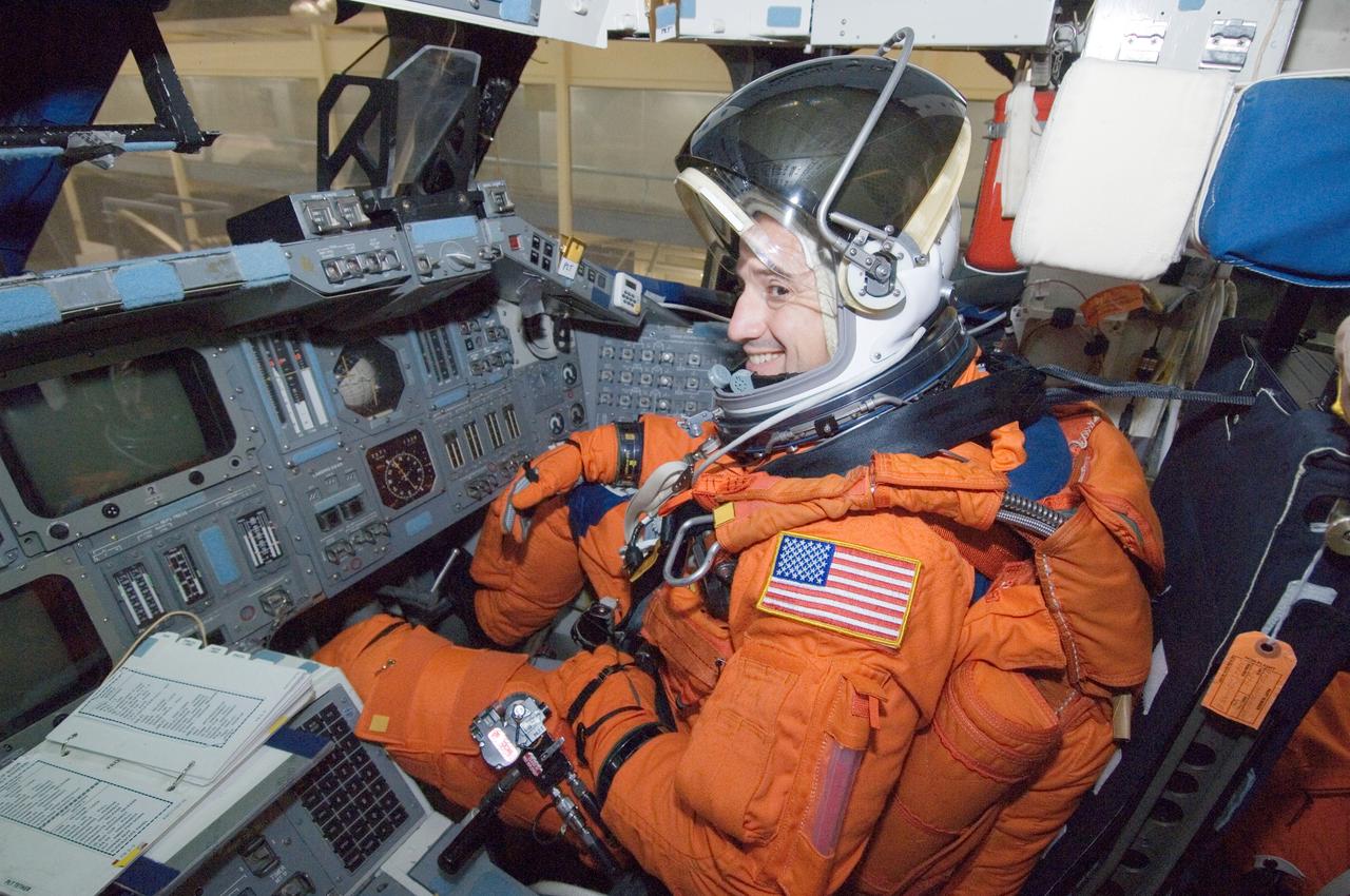 JSC2007-E-18071 (9 April 2007) --- While seated at the pilot's station, astronaut George D. Zamka, STS-120 pilot, participates in a training session in the crew compartment trainer (CCT-2) in the Space Vehicle Mockup Facility at Johnson Space Center. Zamka is wearing a training version of his shuttle launch and entry suit.