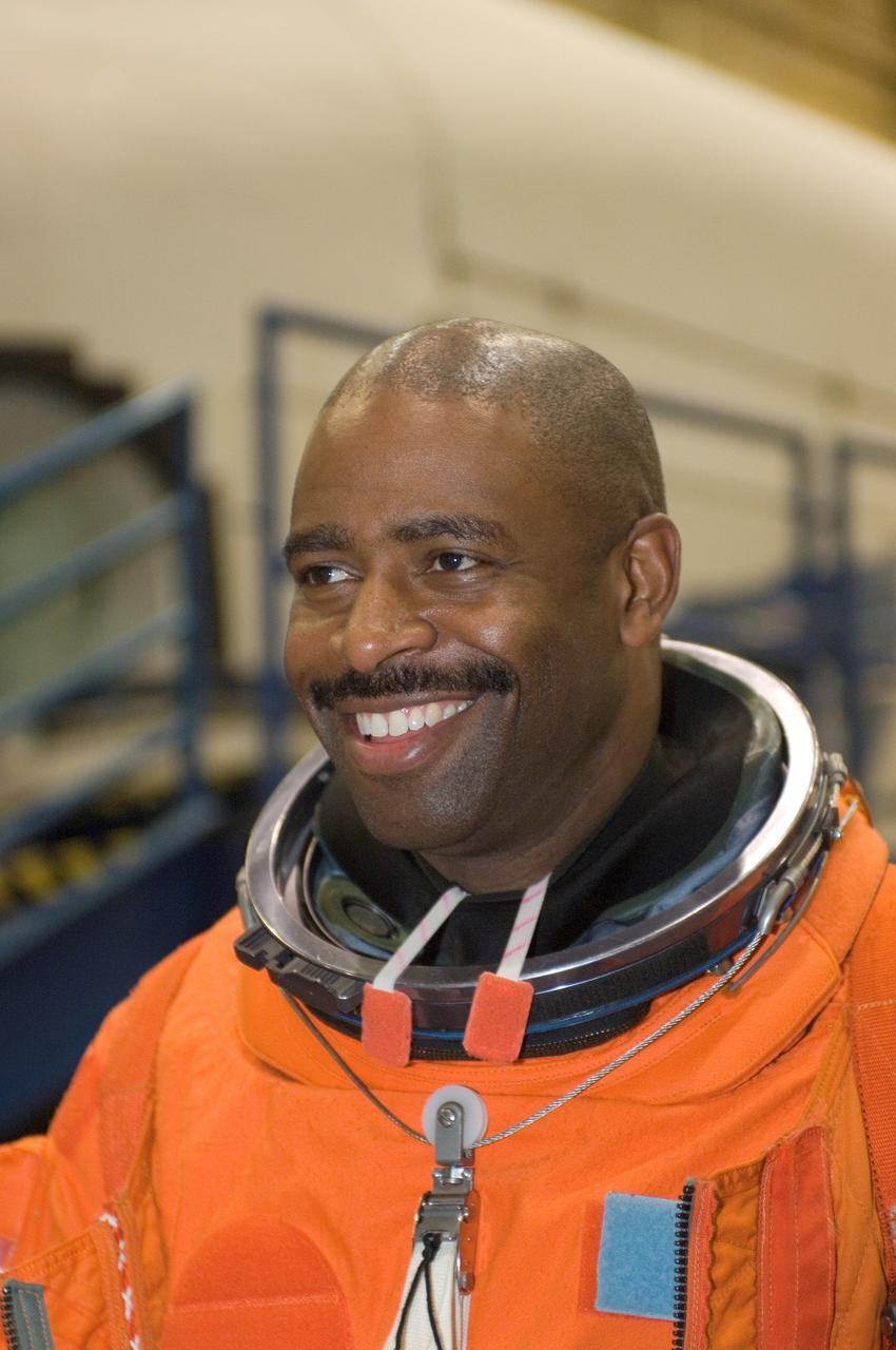JSC2008-E-006643 (23 Jan. 2008) --- Astronaut Leland Melvin, STS-122 mission specialist, awaits the start of a training session in the Space Vehicle Mockup Facility at the Johnson Space Center. Melvin is wearing a training version of his shuttle launch and entry suit.