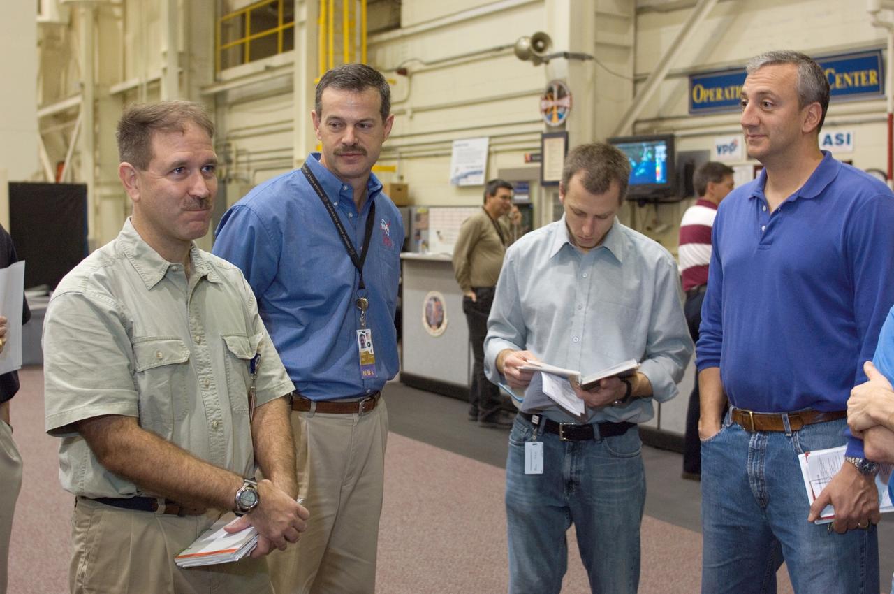 JSC2008-E-008421 (29 Jan. 2008) --- The STS-125 crewmembers participate in a training session in the Space Vehicle Mockup Facility at the Johnson Space Center. Pictured from the left are astronauts John M. Grunsfeld, mission specialist; Scott D. Altman, commander; Andrew J. Feustel and Michael J. Massimino, both mission specialists.