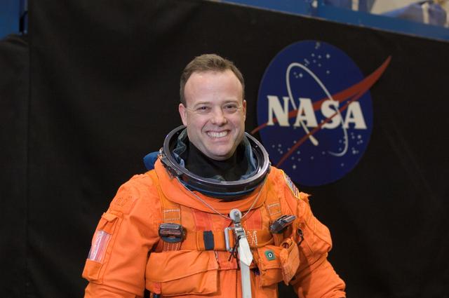 NASA image: STS-124 during crew/training team photos, suit up and ASC/CAP/DES training