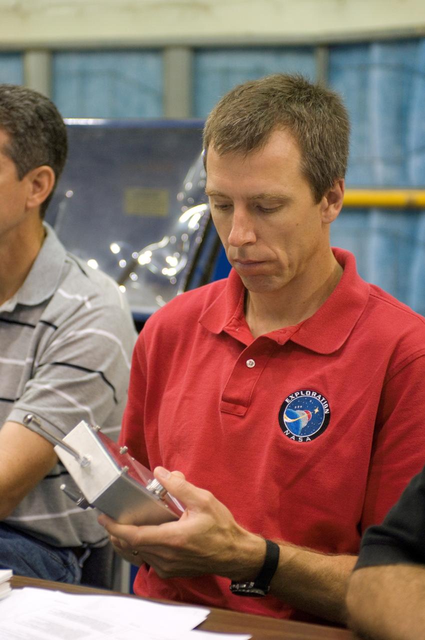 JSC2008-E-031806 (2 April 2008) --- Astronaut Andrew J. Feustel, STS-125 mission specialist, participates in an extravehicular activity (EVA) hardware training session in the Space Vehicle Mockup Facility at NASA's Johnson Space Center.