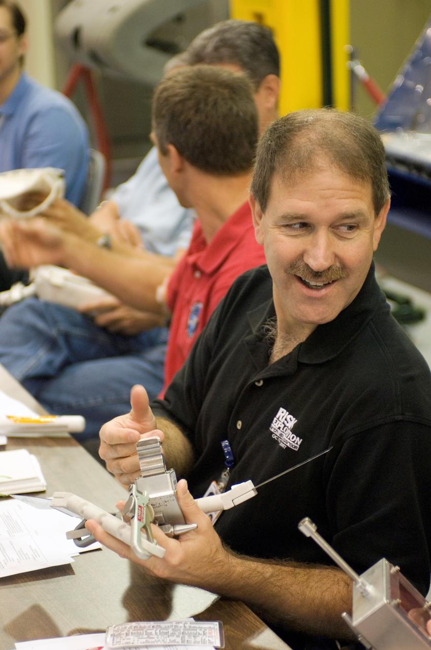 JSC2008-E-031807 (2 April 2008) --- Astronaut John M. Grunsfeld, STS-125 mission specialist, participates in an extravehicular activity (EVA) hardware training session in the Space Vehicle Mockup Facility at NASA's Johnson Space Center.