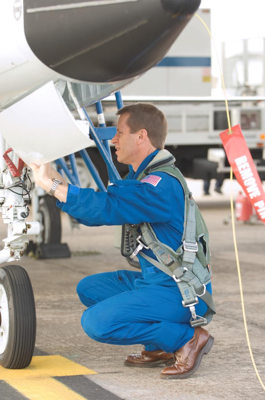 JSC2008-E-035360 (17 April 2008) --- Astronaut Gregory C. Johnson, STS-125 pilot, prepares for a flight in a NASA T-38 trainer jet at Ellington Field near NASA's Johnson Space Center.