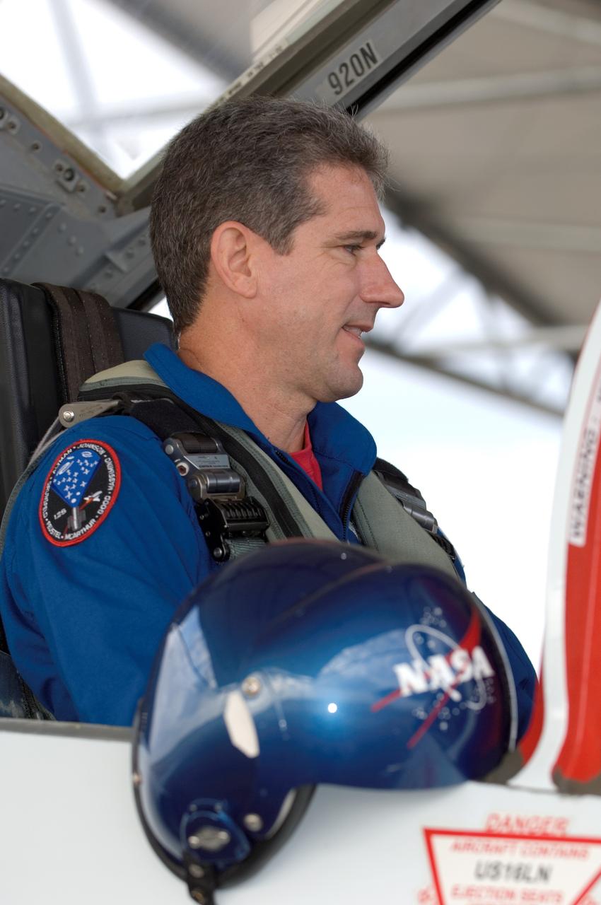 JSC2008-E-035362 (17 April 2008) --- Astronaut Michael T. Good, STS-125 mission specialist, photographed in the rear station of a NASA T-38 trainer jet, prepares for a flight at Ellington Field near NASA's Johnson Space Center.