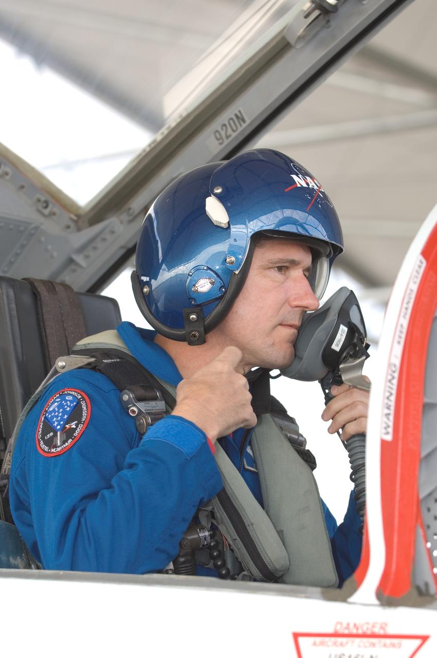 JSC2008-E-035363 (17 April 2008) --- Astronaut Michael T. Good, STS-125 mission specialist, photographed in the rear station of a NASA T-38 trainer jet, prepares for a flight at Ellington Field near NASA's Johnson Space Center.
