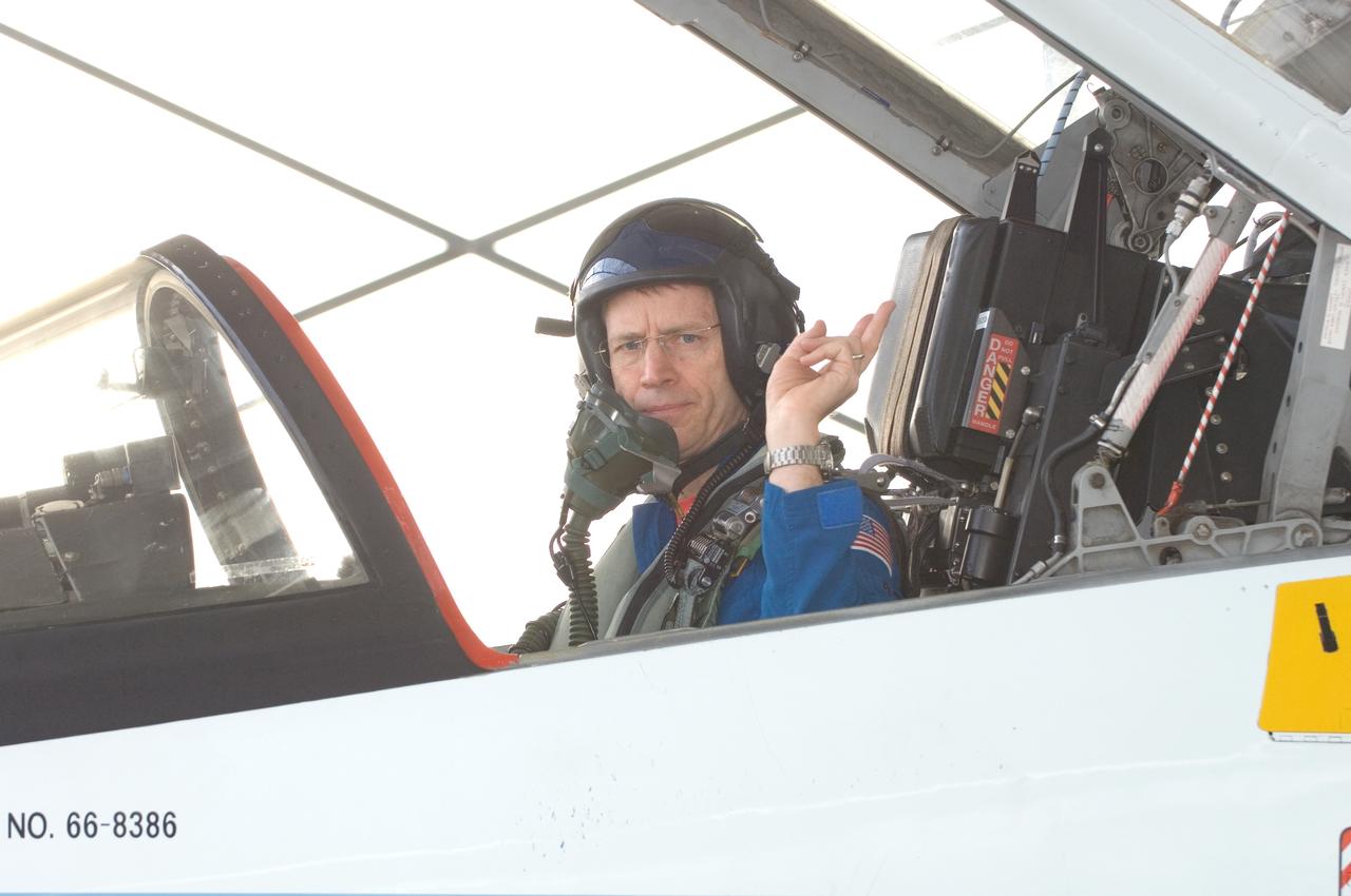 JSC2008-E-035366 (17 April 2008) --- Astronaut Gregory C. Johnson, STS-125 pilot, prepares for a flight in a NASA T-38 trainer jet at Ellington Field near NASA's Johnson Space Center.