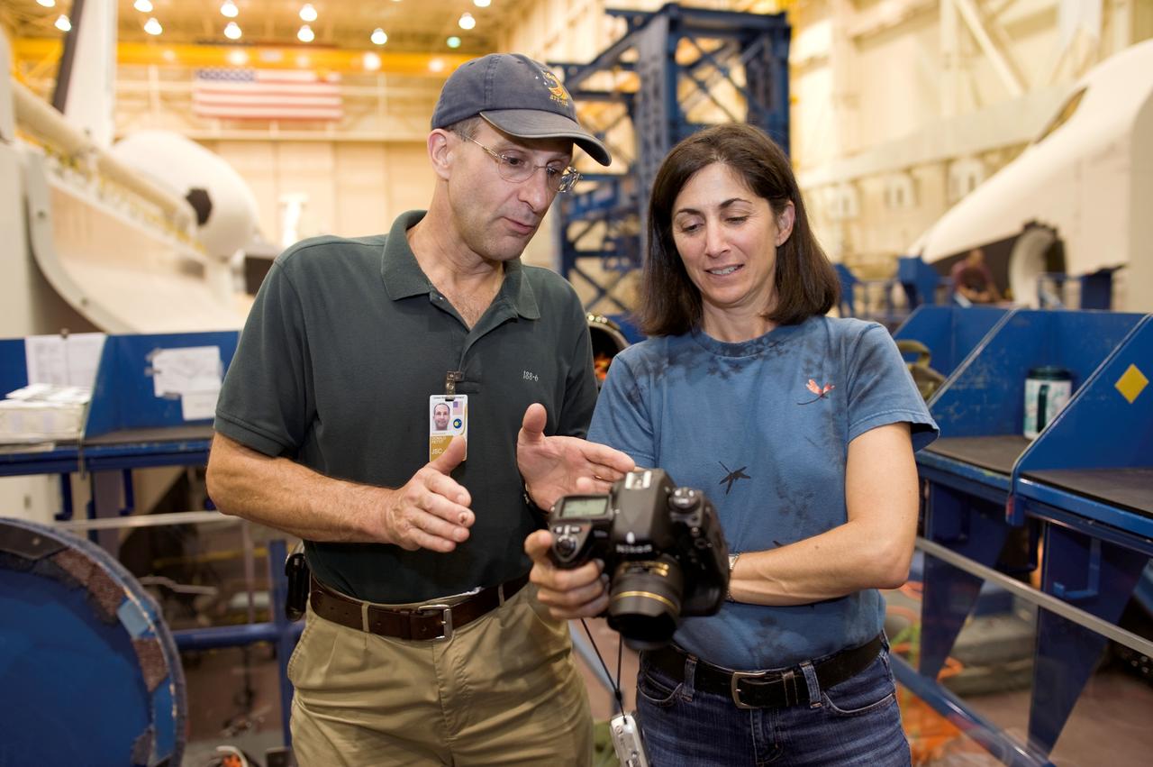 JSC2008-E-044878 (3 June 2008) --- Astronauts Donald R. Pettit, STS-126 mission specialist, and Nicole P. Stott, Expedition 19 flight engineer, participate in a training session in the Space Vehicle Mockup Facility at NASA's Johnson Space Center.
