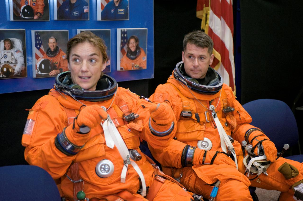 JSC2008-E-044936 (3 June 2008) --- Astronauts Heidemarie M. Stefanyshyn-Piper and Robert S. (Shane) Kimbrough, both STS-126 mission specialists, prepare for a Full Fuselage Trainer (FFT) mockup (out of frame) training session in the Space Vehicle Mockup Facility at NASA's Johnson Space Center. Stefanyshyn-Piper and Kimbrough are wearing training versions of their shuttle launch and entry suits.