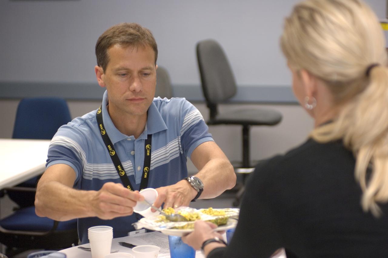 JSC2008-E-047934 (19 June 2008) --- Astronaut Thomas H. Marshburn, STS-127 mission specialist, participates in a food tasting session in the Flight Projects Division Laboratory at NASA's Johnson Space Center.