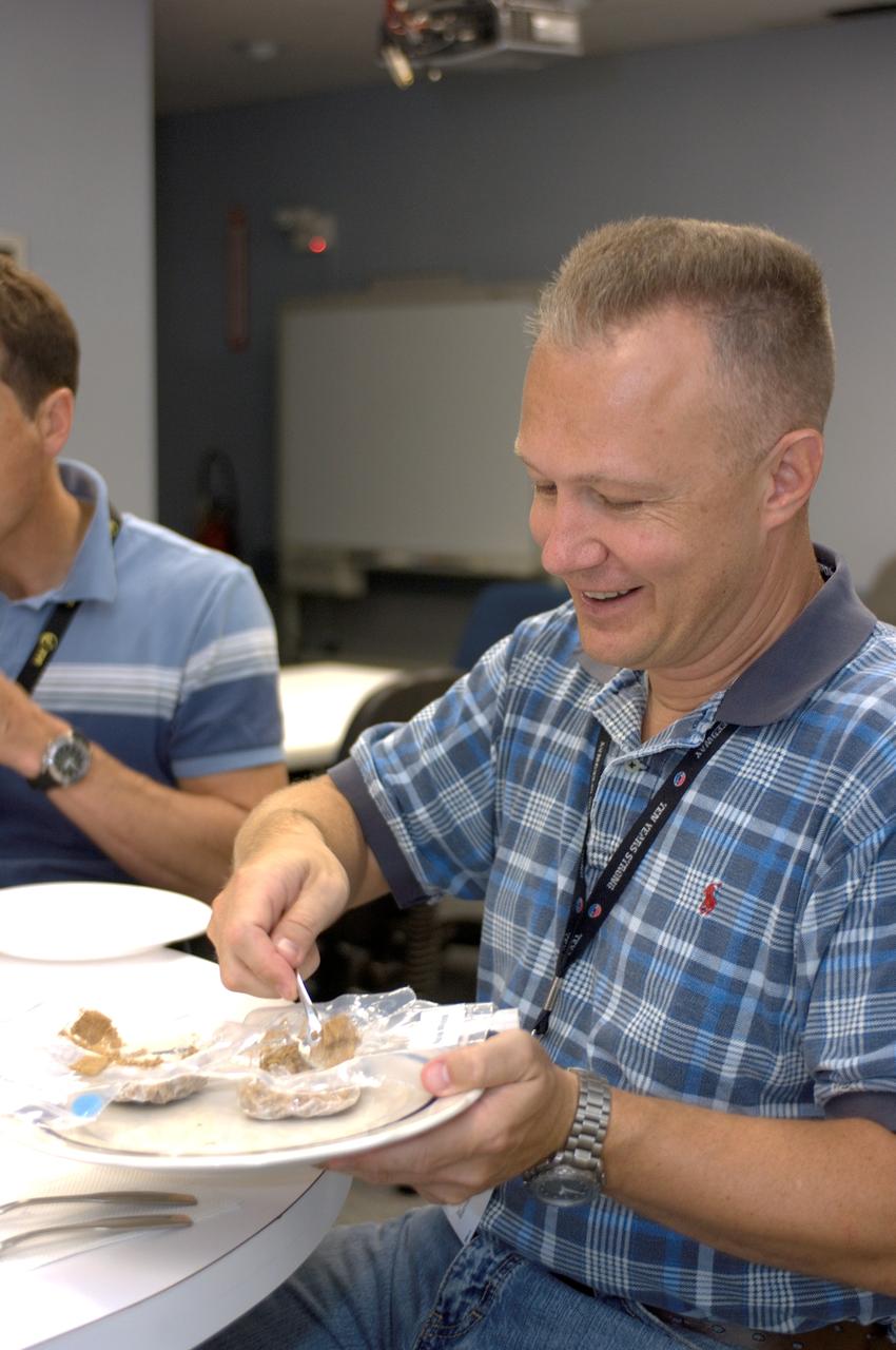 JSC2008-E-047942 (19 June 2008) --- Astronaut Douglas G. Hurley, STS-127 pilot, participates in a food tasting session in the Flight Projects Division Laboratory at NASA's Johnson Space Center.