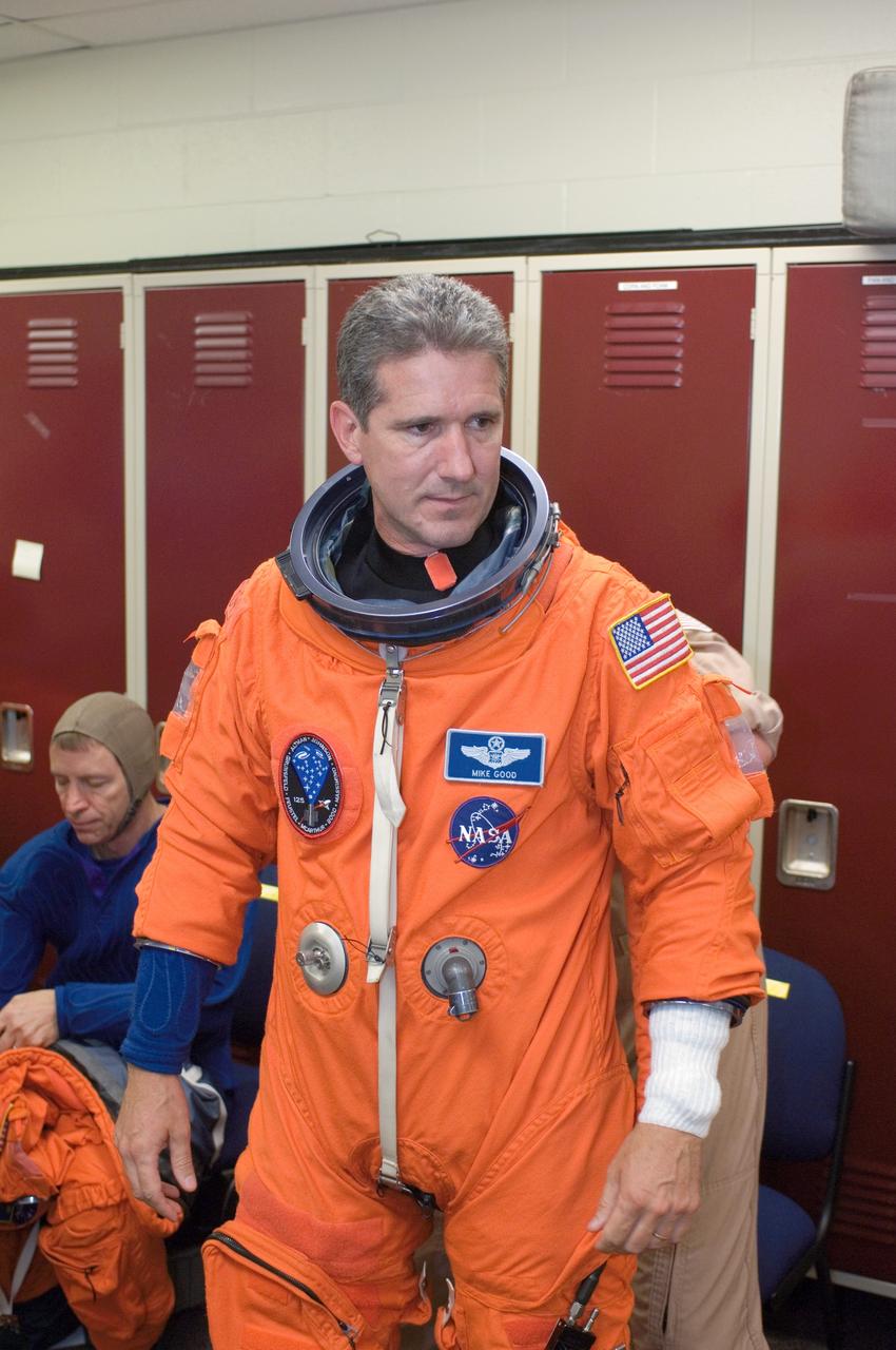 JSC2008-E-047950 (4 June 2008) --- Attired in a training version of his shuttle launch and entry suit, astronaut Michael T. Good, STS-125 mission specialist, awaits the start of a training session in the Space Vehicle Mockup Facility at NASA's Johnson Space Center.