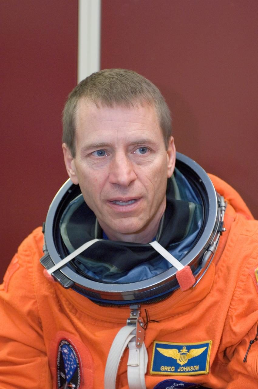 JSC2008-E-047955 (4 June 2008) --- Attired in a training version of his shuttle launch and entry suit, astronaut Gregory C. Johnson, STS-125 pilot, awaits the start of a training session in the Space Vehicle Mockup Facility at NASA's Johnson Space Center.