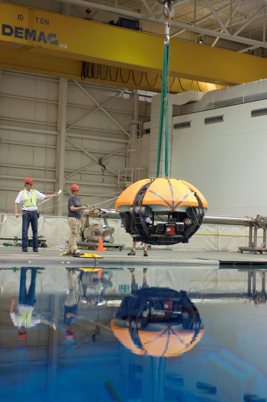 View of the Autonomous Underwater Vehicle (AUV) known as Endurance designed by Stone Aerospace being lowered into the Neutral Buoyancy Laboratory (NBL) pool at the Sonny Carter Training Facility (SCTF) for testing.  The AUV is being tested for potential exploration of Jupiter's moon Europa.  This image was featured in the August 2008 JSC Roundup, Volume 47, Number 8.