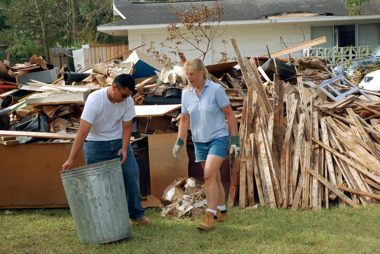 Hurricane IKE Recovery Efforts - MOD Volunteers  Location: Clear LAke Area  Subject: MOD Volunteers assist fellow employees at their homes during the recovery from hurricane IKE.  Photographer: Tom Murray (USA Photographer)