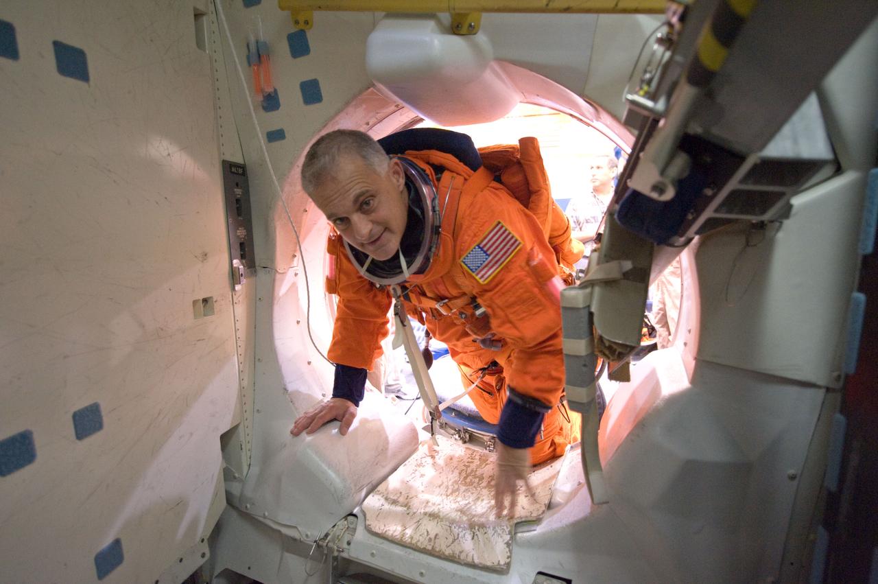 JSC2008-E-122439 (7 Oct. 2008) --- Attired in a training version of his shuttle launch and entry suit, astronaut Dave Wolf, STS-127 mission specialist, participates in a training session in one of the full-scale trainers in the Space Vehicle Mockup Facility at NASA's Johnson Space Center.