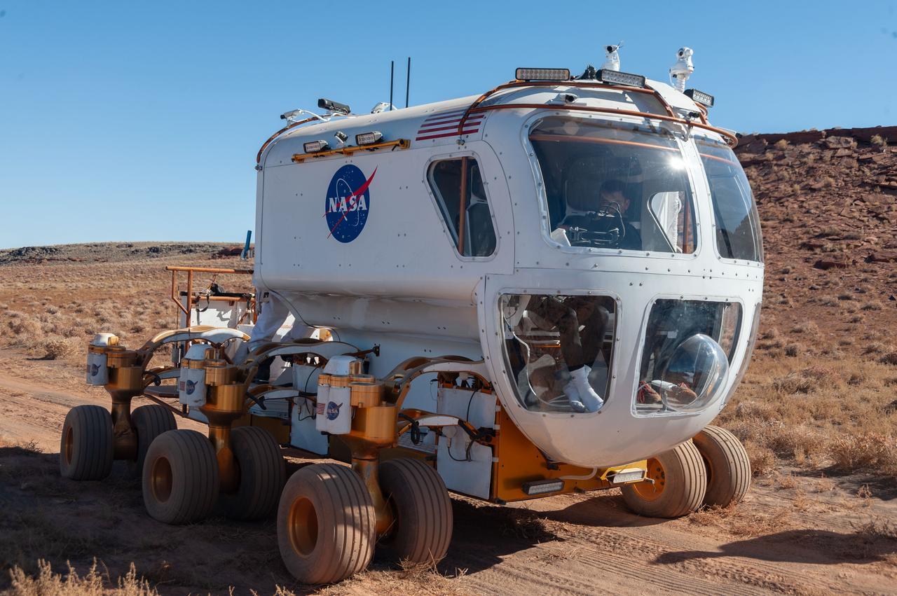 A front view of the Lunar Electric Rover (LER) during the Desert Research and Technology Studies (RATS) remote field test at Black Point Lava Flow, Arizona in 2008.