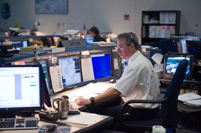 NASA image: STS-126 Flight Controllers on Console - (Orbit Shift 1) - Bldg. 30 south. 