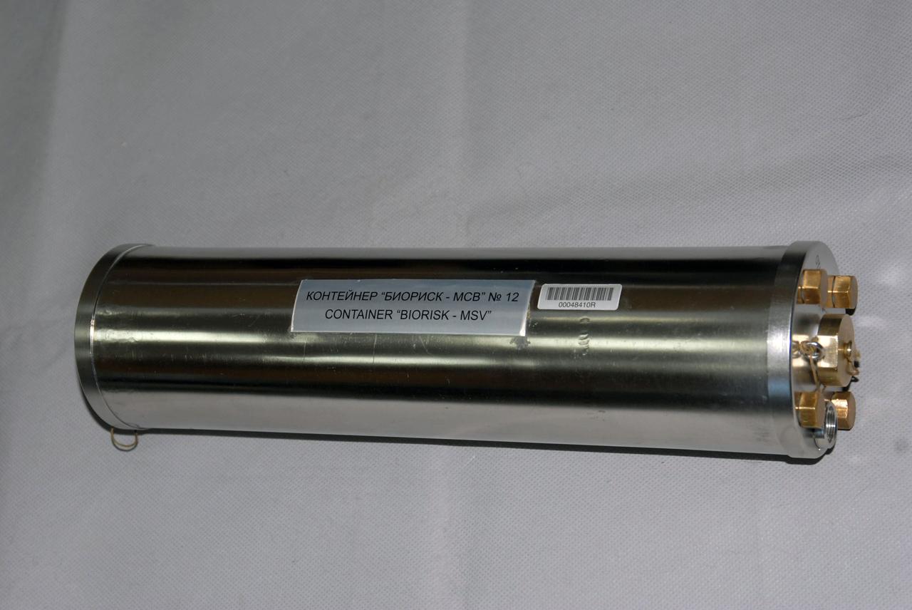 jsc2008e152661 (12/8/2008) --- A preflight view of a Biorisk-MSV container, part of the Biorisk experiment equipment to be delivered to the ISS during the 31P flight. The Influence of Factors of the Space Environment on the Condition of the System of Microorganisms-Hosts Relating to the Problem of Environmental Safety of Flight Techniques and Planetary Quarantine (Biorisk) investigation aims to obtain new data on physical and genetic changes in bacteria and fungi typically found on spacecraft equipment, and also in various biological test objects (higher plant seeds, dormant forms of lower crustaceans) under exposure in the interior ISS compartments and on the exterior ISS surfaces.