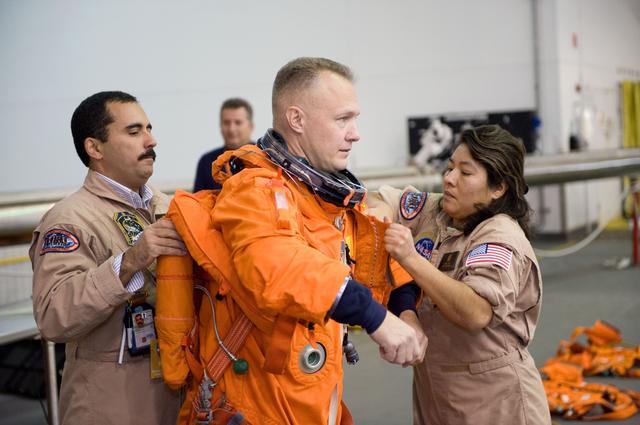 NASA image: STS-127 water survival training at the NBL pool.