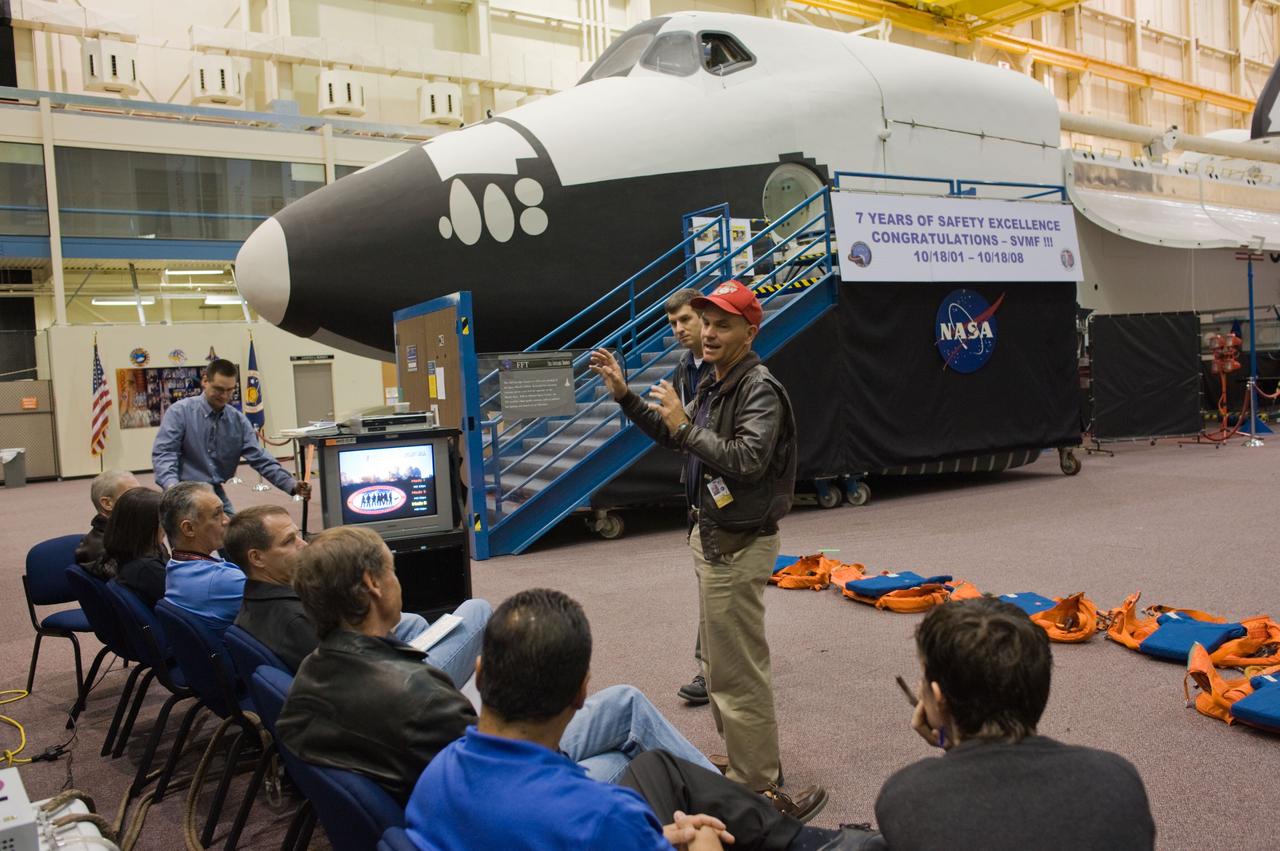 STS-128 crew during CCT BAILOUT with Expedition astronaut Nicole Stott. 