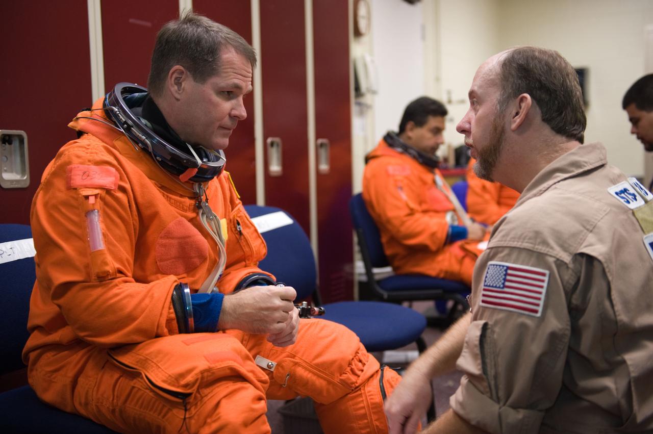 STS-128 crew during CCT BAILOUT with Expedition astronaut Nicole Stott. 