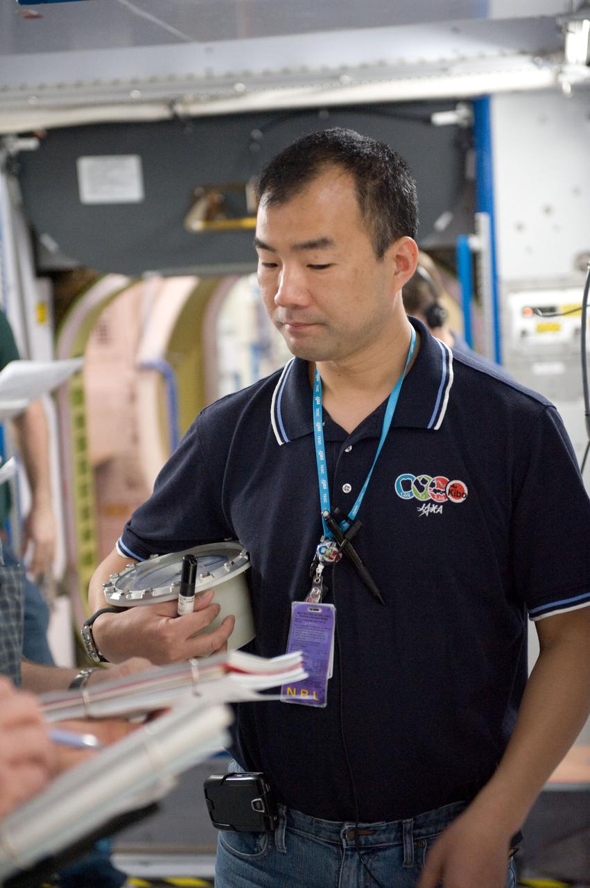 JSC2009-E-053501 (6 March 2009) --- Japan Aerospace Exploration Agency (JAXA) astronaut Soichi Noguchi, Expedition 22/23 flight engineer, participates in an emergency procedure training session in an International Space Station mock-up/trainer in the Space Vehicle Mock-up Facility at NASA?s Johnson Space Center.