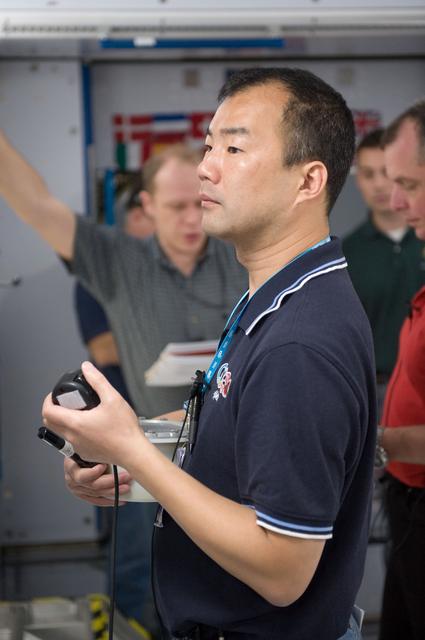 NASA image: Expedition 22 crew member Soichi Noguchi performing emergency procedure training.