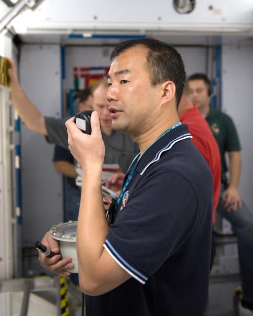 NASA image: Expedition 22 crew member Soichi Noguchi performing emergency procedure training.